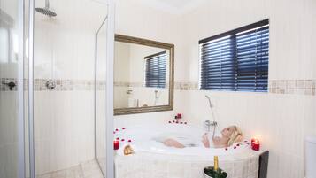 Combined shower/tub, free toiletries, hair dryer, bathrobes