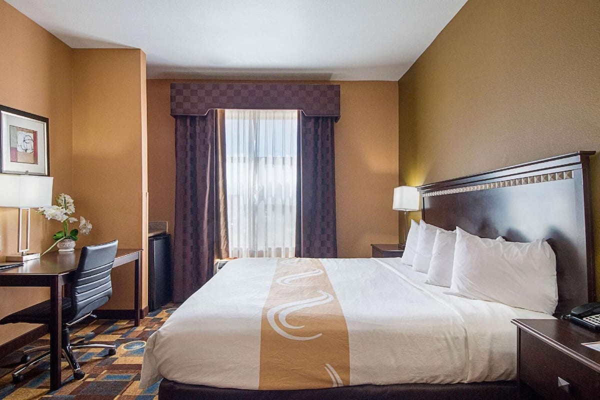 Down comforters, pillowtop beds, desk, blackout drapes