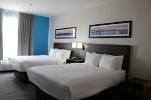 Suite, Multiple Beds, Non Smoking | Down comforters, pillowtop beds, desk, blackout drapes - Quality Inn & Suites Buda (Buda)