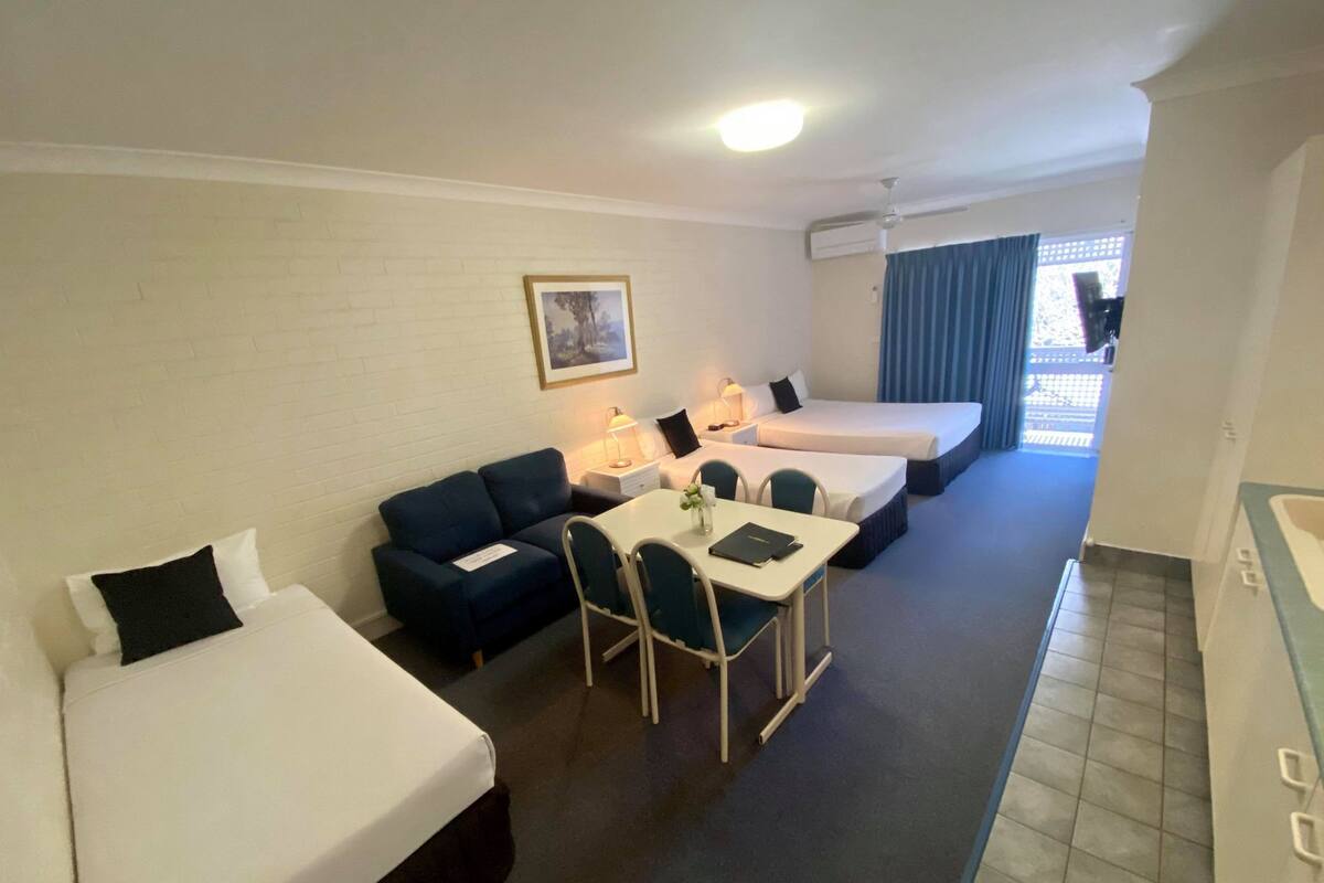 Family Room | Minibar, in-room safe, desk, iron/ironing board