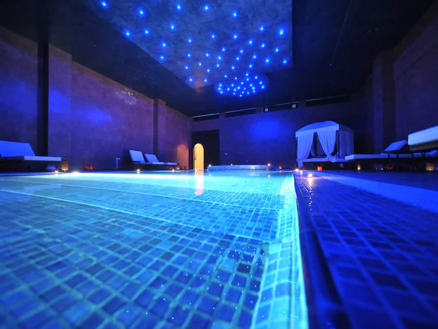 Indoor pool, outdoor pool, free pool cabanas, pool umbrellas