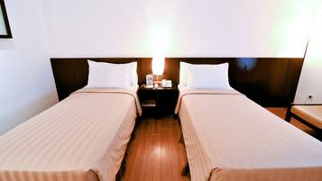 Ropa de cama de alta calidad y minibar