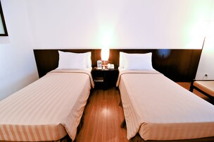 Deluxe İki Ayrı Yataklı Oda | Kaliteli yatak takımı, minibar, odada kasa, ütü/ütü masası 