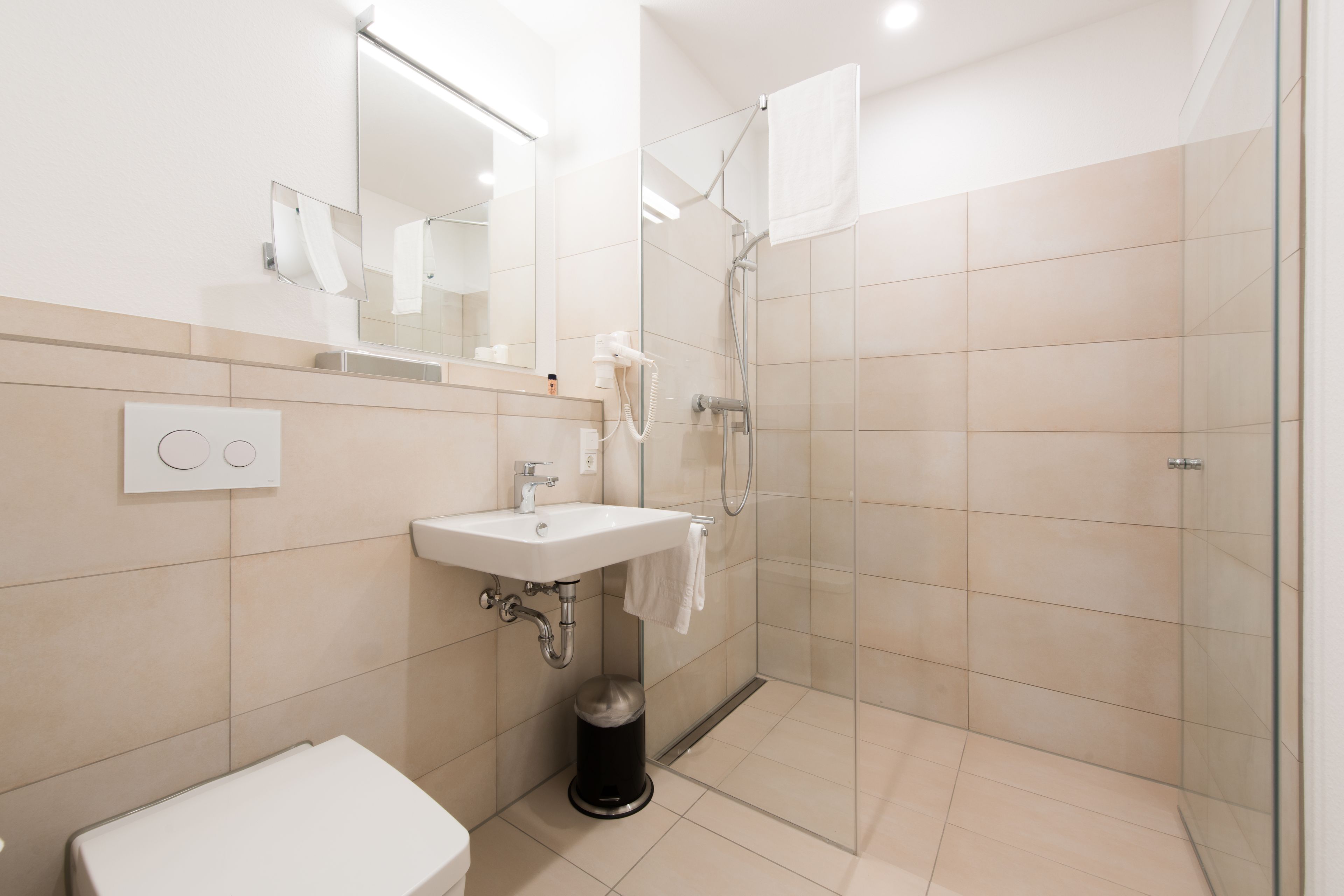 classic double room | bathroom | shower, hair dryer, towels