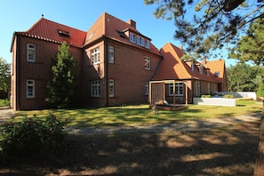 Stroll through the beautifully manicured lawn and enjoy the serene surroundings of this charming home.