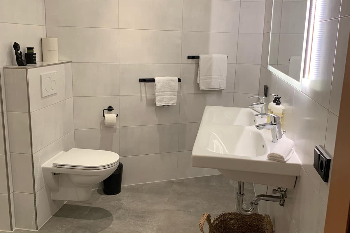 family suite | bathroom | shower, hair dryer, towels