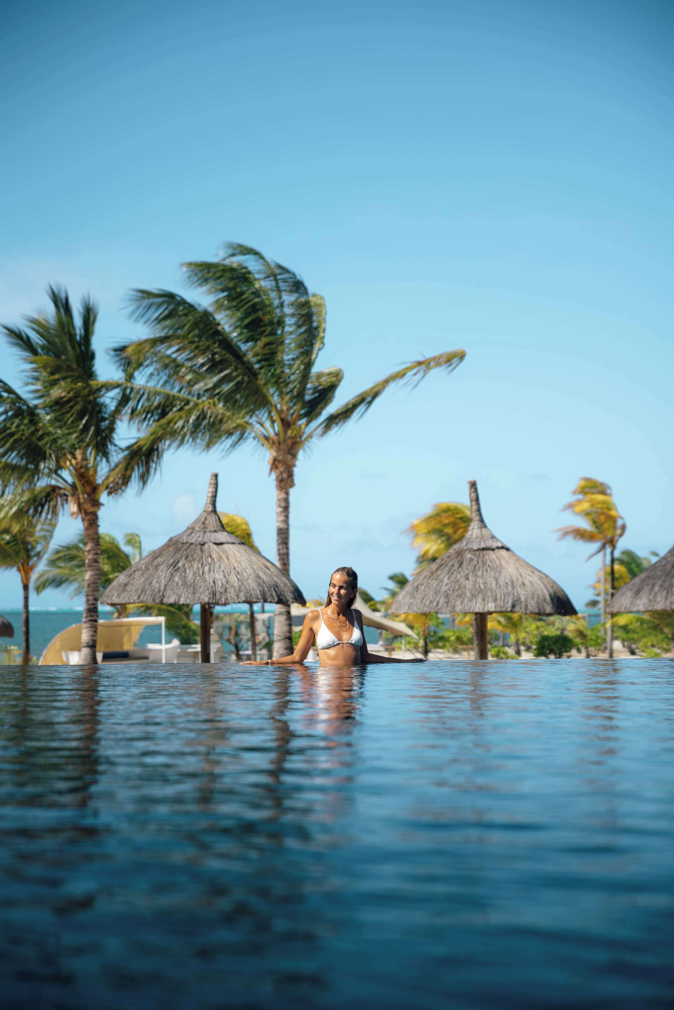 2 outdoor pools, pool umbrellas, pool loungers