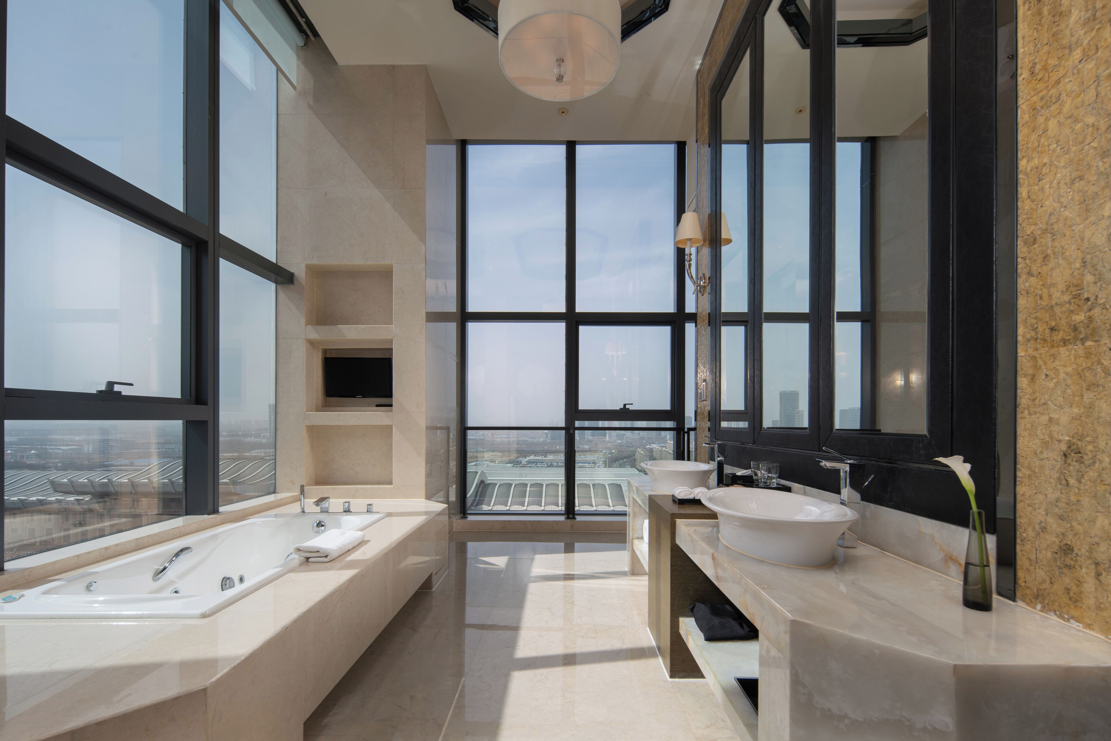 presidential suite the level | bathroom | separate bathtub and shower, rainfall showerhead