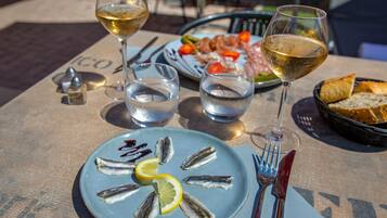 Breakfast, lunch, dinner served; Fusion cuisine, pool views