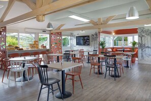 Breakfast, lunch, dinner served; Fusion cuisine, pool views