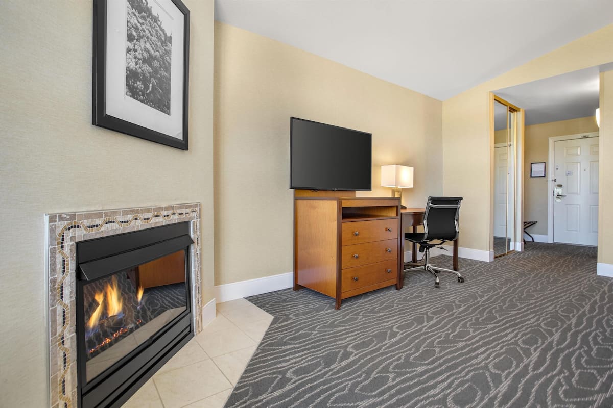 Suite, 1 King Bed, Non Smoking, Fireplace (2nd Floor) | Hypo-allergenic bedding, desk, laptop workspace, iron/ironing board