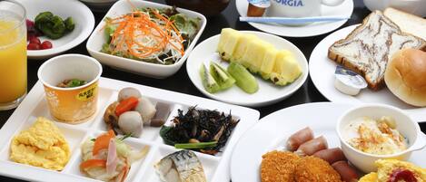 A variety of dishes including rice, soup, and bread.