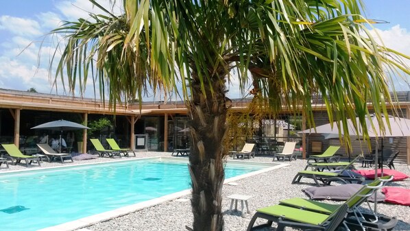 2 outdoor pools, pool umbrellas, sun loungers