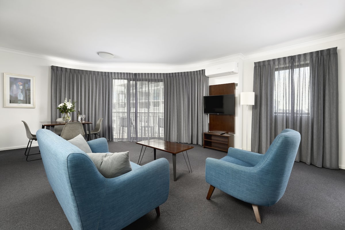 One Bedroom Executive Apartment | Living area | 43-inch Smart TV with digital channels, TV