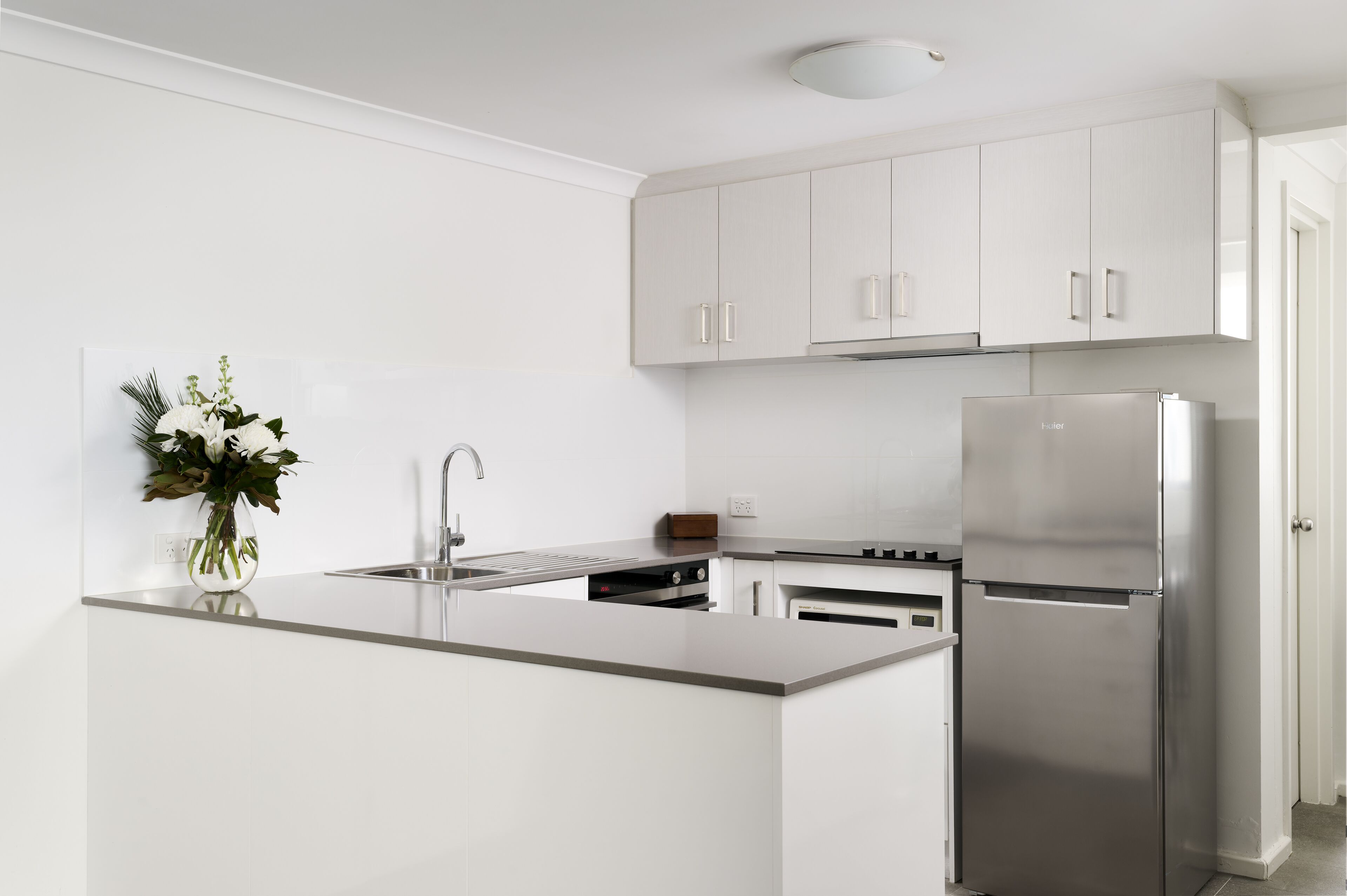 Two Bedroom Superior Apartment | Private kitchen | Full-sized fridge, microwave, oven, stovetop