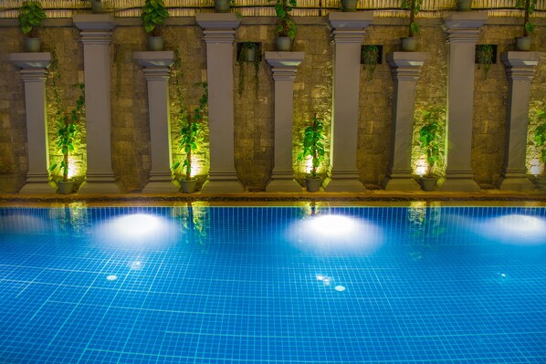 Outdoor pool, open 7 AM to 10 PM, sun loungers