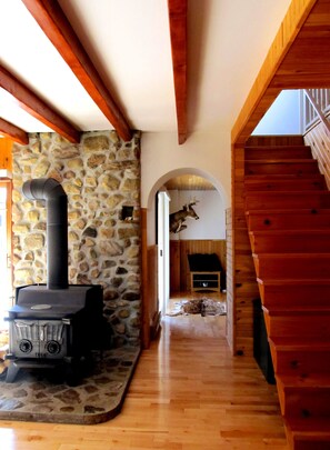 Traditional Chalet, 3 Bedrooms, 2 Bathrooms, Mountain View | Living area | 42-inch flat-screen TV with satellite channels, TV, fireplace - Chalet Rustique CRDS Tremblant (Lac-Superieur)