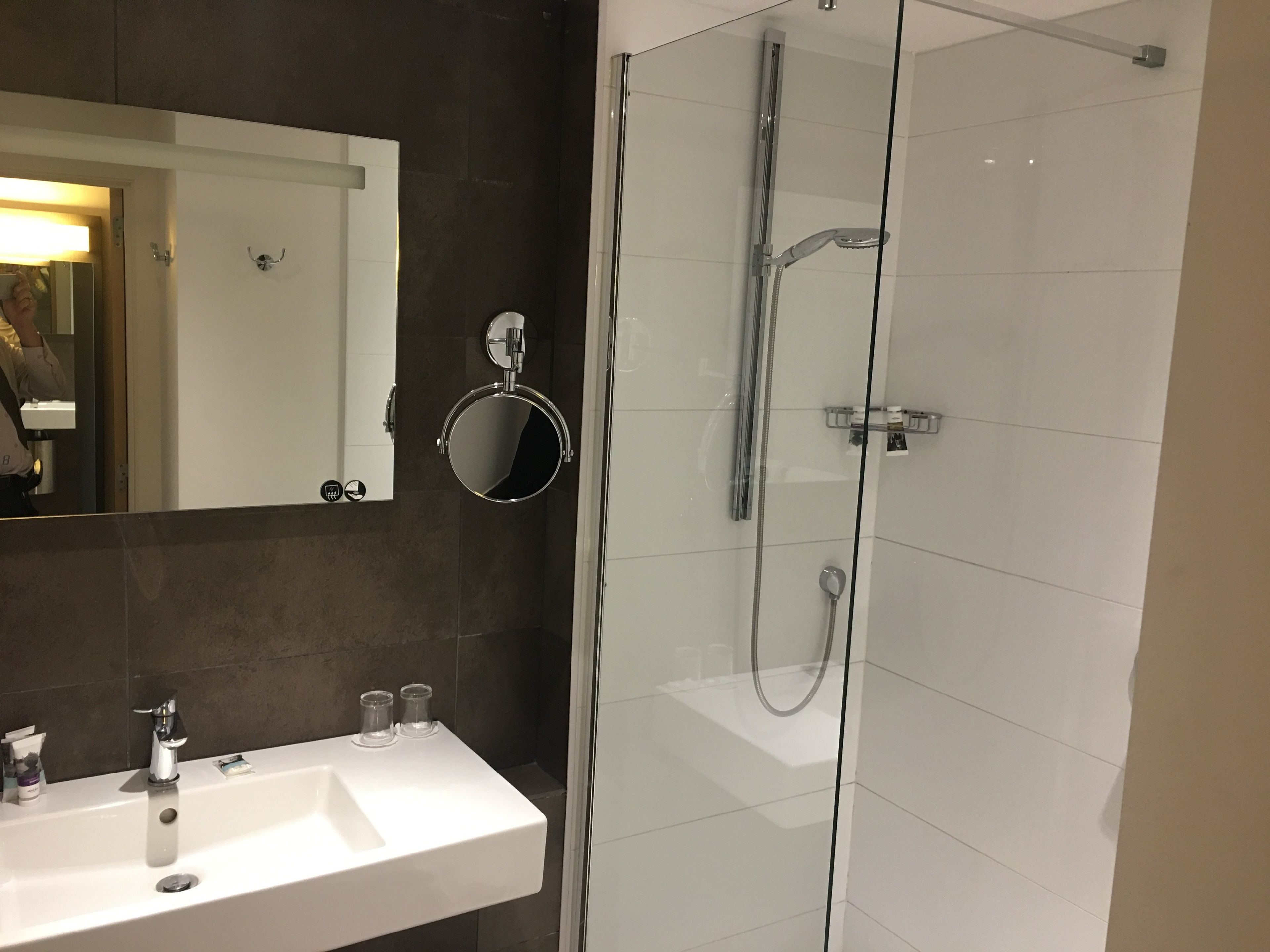 rainfall showerhead, eco-friendly toiletries, hair dryer, towels