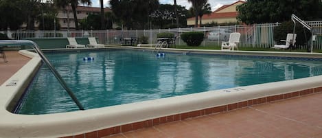 Outdoor pool, pool umbrellas, sun loungers