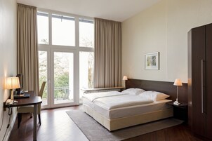 Standard Single Room | Hypo-allergenic bedding, desk, blackout drapes, soundproofing