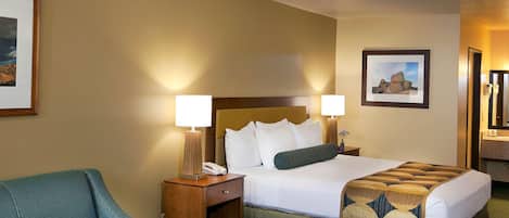 Desk, laptop workspace, blackout drapes, iron/ironing board