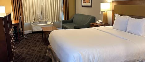 Desk, laptop workspace, blackout drapes, iron/ironing board