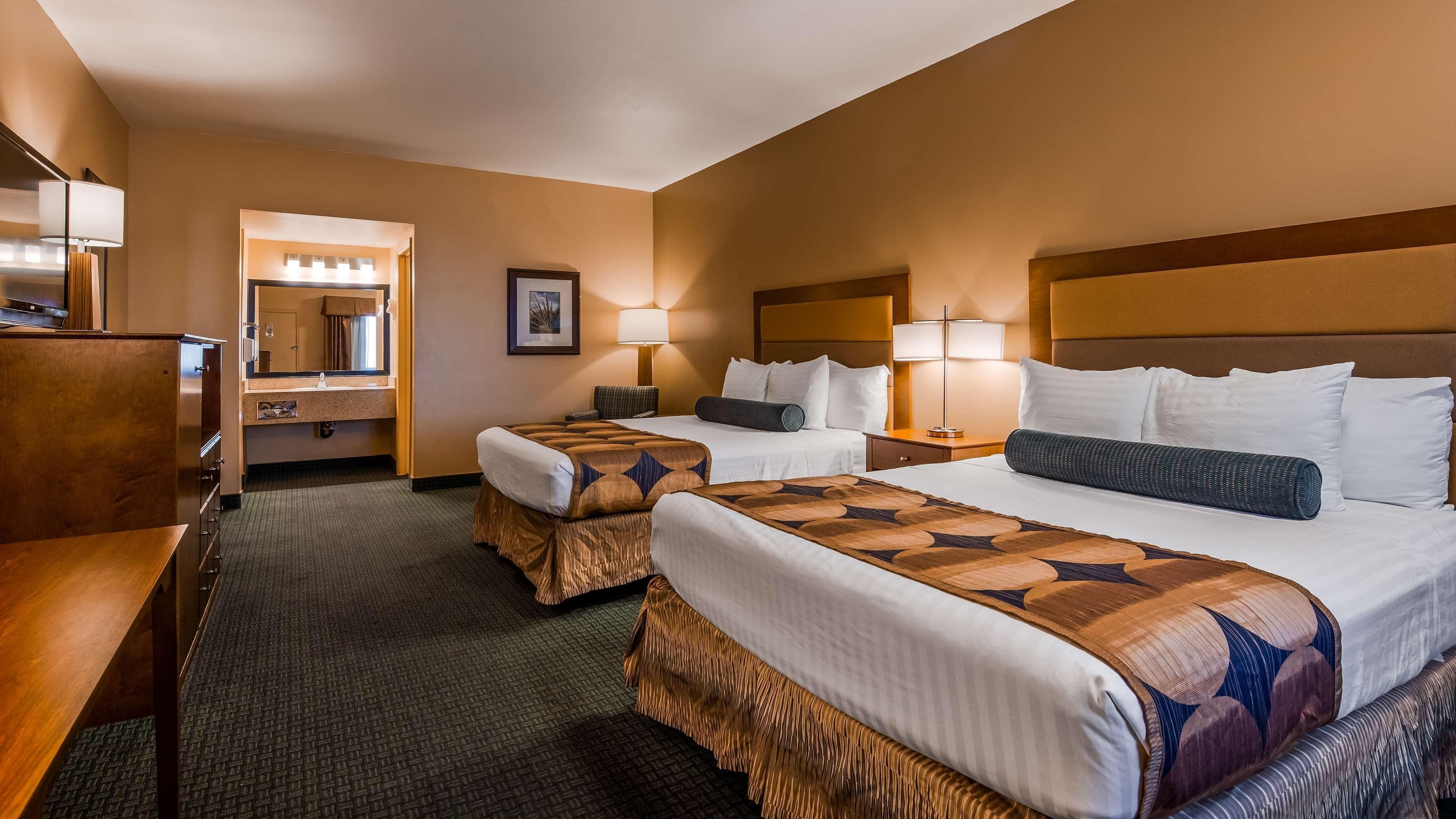 Desk, laptop workspace, blackout curtains, iron/ironing board