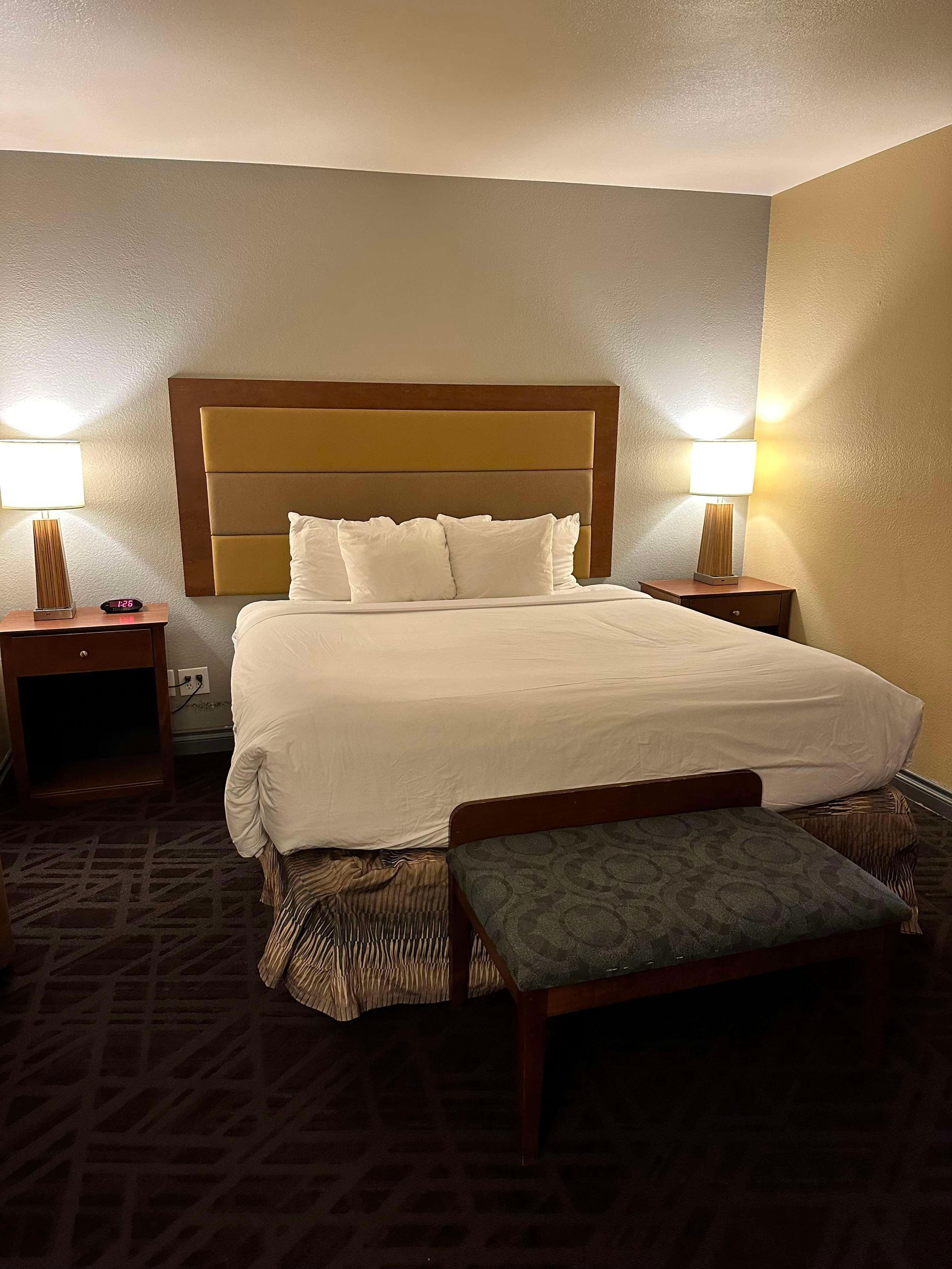 Desk, laptop workspace, blackout curtains, iron/ironing board