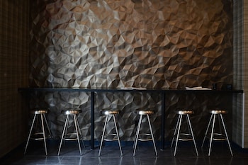 Sitting area in hotel lobby at The Lex NYC
