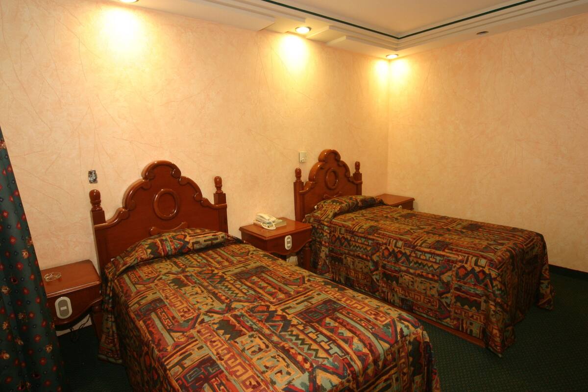 Ropa de cama de alta calidad, cubrecamas y cortinas blackout 