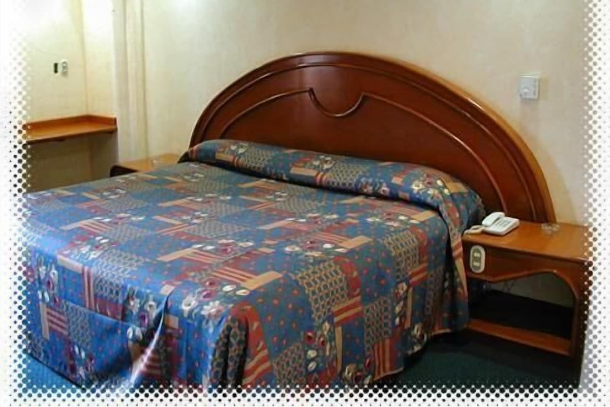 Premium bedding, down duvets, blackout curtains, free WiFi