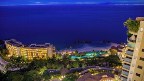 A resort with multiple buildings, a pool area, and a beach. - Hotel Mousai Puerto Vallarta Adults Only (Puerto Vallarta)