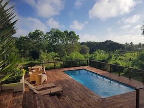 Outdoor pool, pool umbrellas, sun loungers