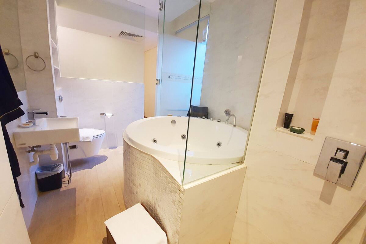 premier suite, 1 bedroom, bathtub (indoor) | bathroom | free toiletries, hair dryer, slippers, bidet