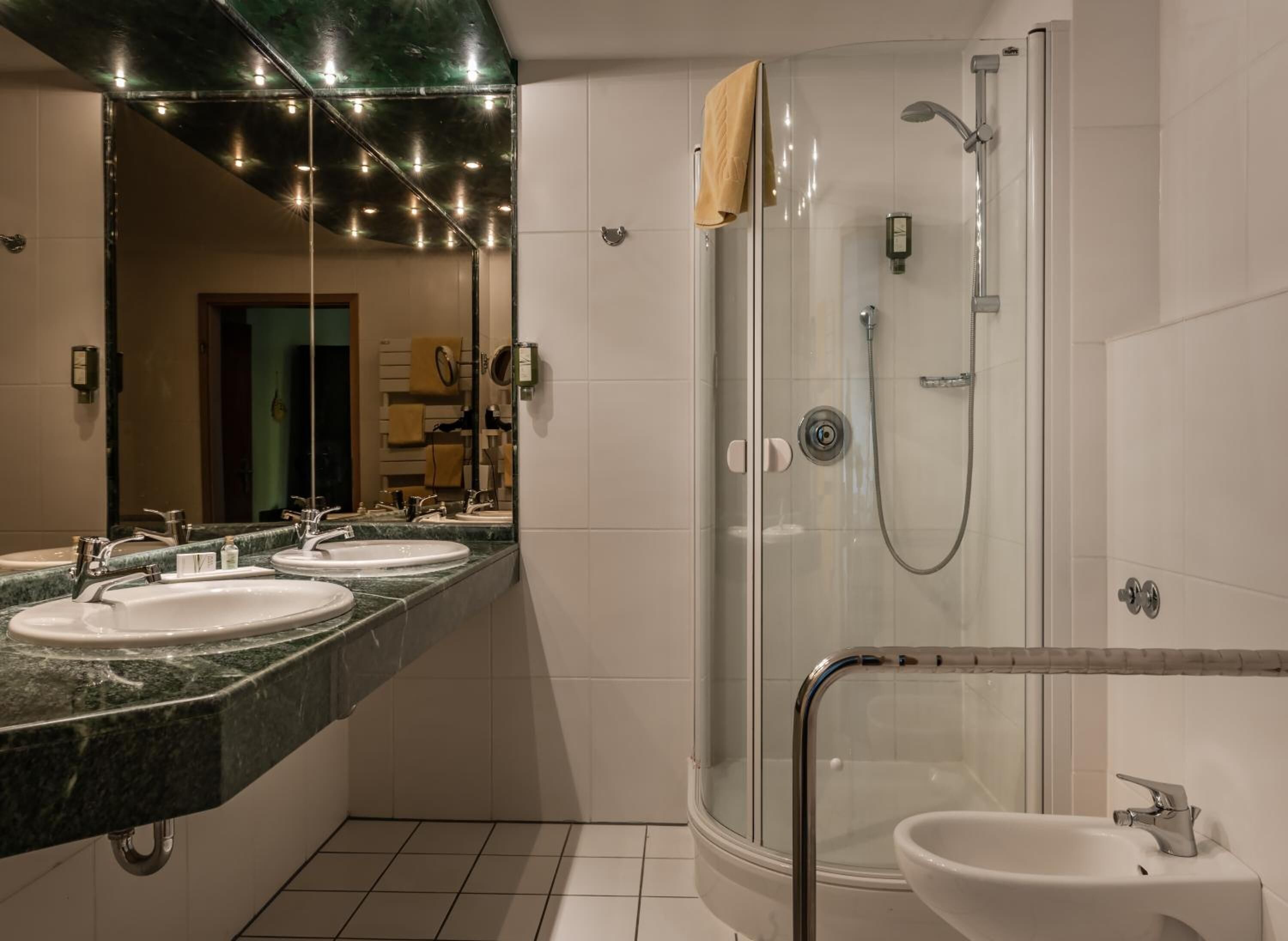 shower, hair dryer, bathrobes, towels