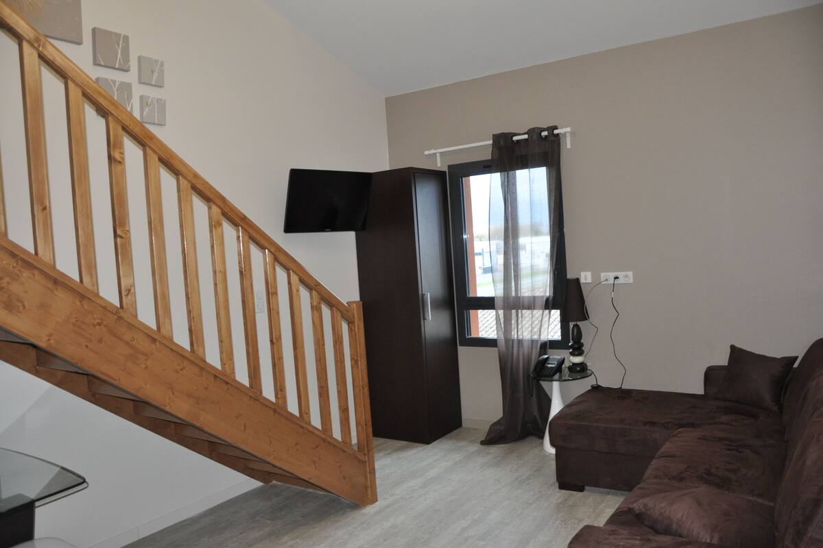 quadruple room | living room | 22-inch flat-screen tv with digital channels, tv