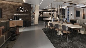 A modern interior with a dining area, kitchen, and living space. - Hyatt House Washington DC / Downtown / Convention Center (Washington)