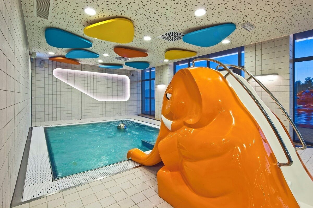 indoor pool, open 9 am to 9 pm, pool loungers, lifeguards on site