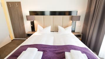 Double Room | Minibar, in-room safe, desk, iron/ironing board