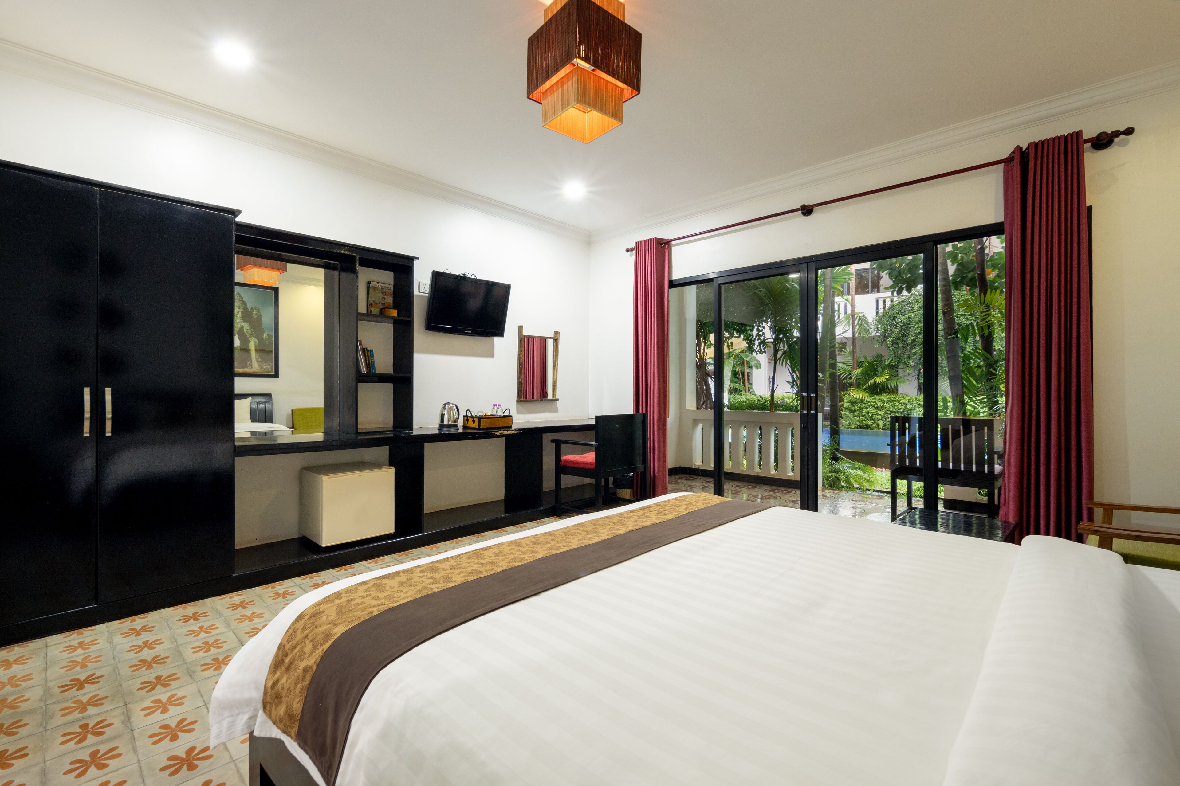 deluxe double room, pool view | premium bedding, select comfort beds, minibar, in-room safe