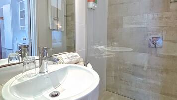Shower, free toiletries, hair dryer, towels