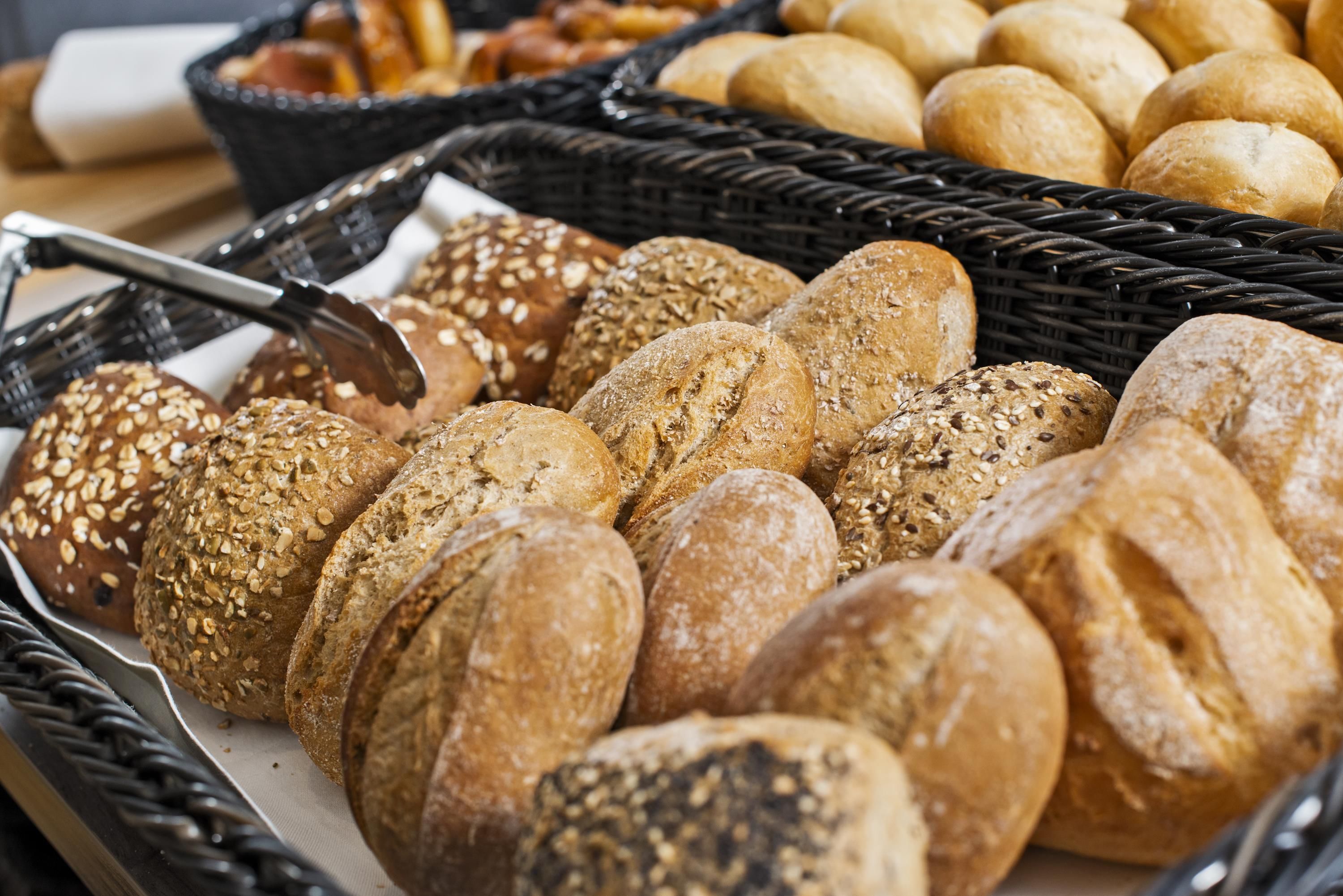 A variety of breads in baskets.
