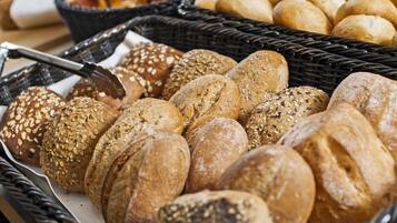 A variety of breads in baskets.