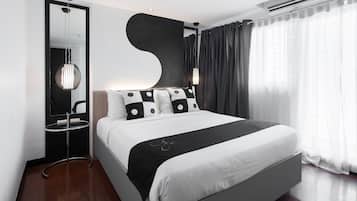 Two Bedroom Premier | Minibar, in-room safe, individually decorated, blackout curtains