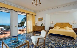 Junior Suite, Sea View | Minibar, in-room safe, desk, free WiFi