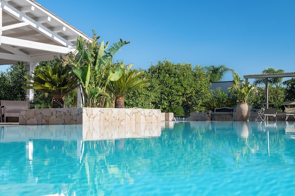 2 outdoor pools, open 10:00 AM to 8:00 PM, pool umbrellas, sun loungers