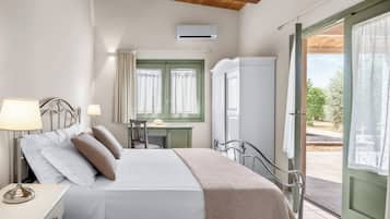 Junior Suite | 1 bedroom, blackout drapes, free WiFi, bed sheets