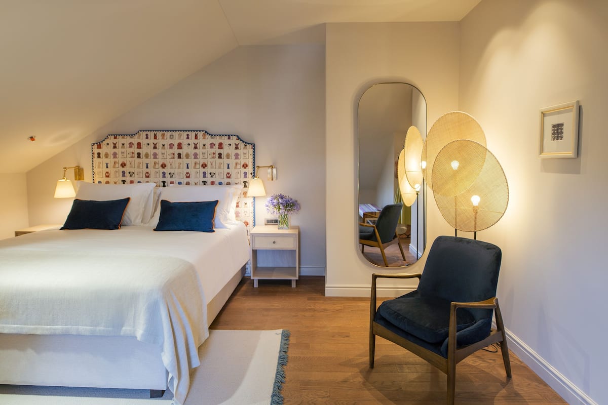 Attic Room | Minibar, in-room safe, individually decorated, individually furnished