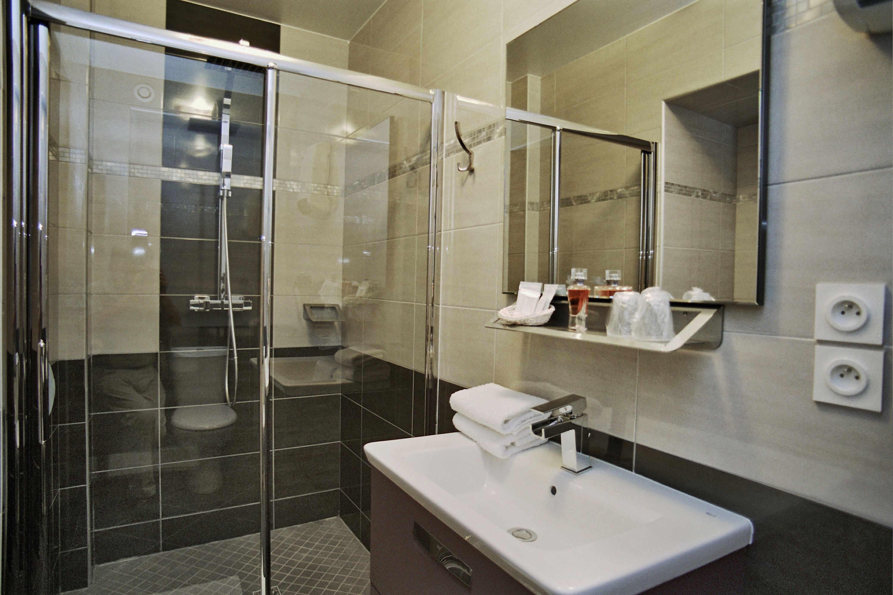 superior triple room | bathroom | shower, free toiletries, hair dryer, towels