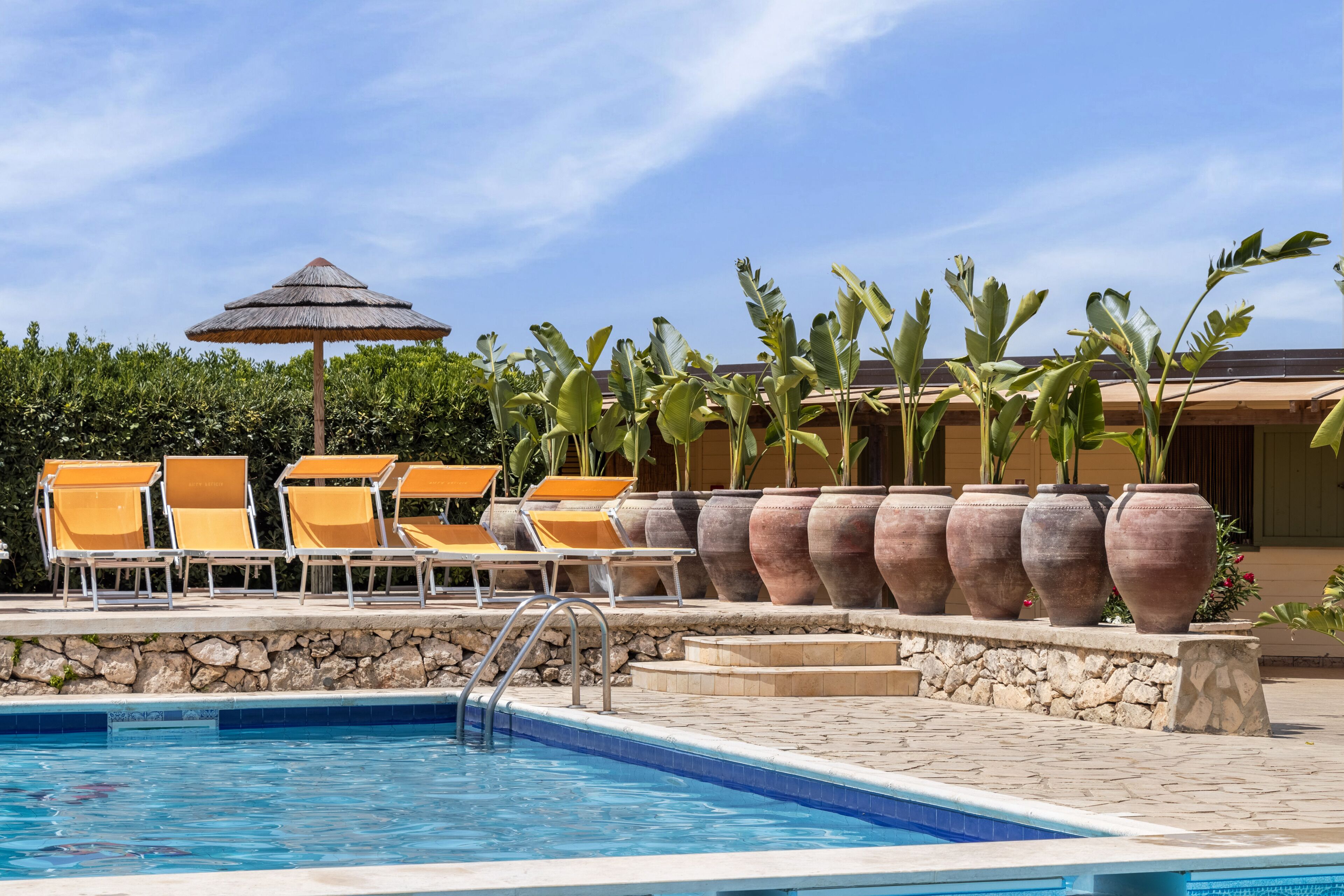 Outdoor pool, pool umbrellas, pool loungers